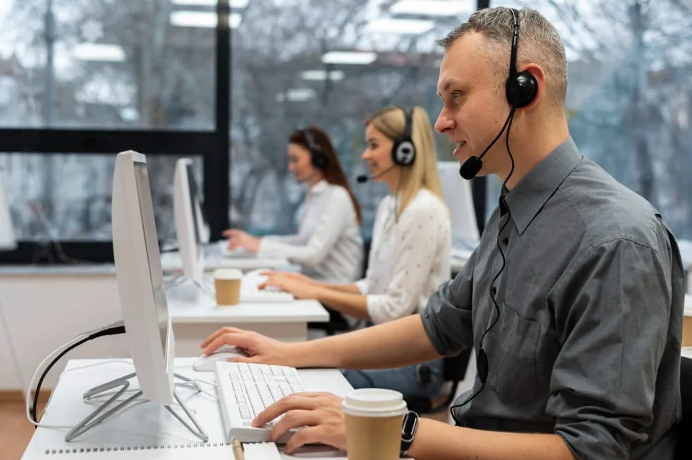 Mega Build Up sales and support team with headsets, ready to prepare your IT and AI quote